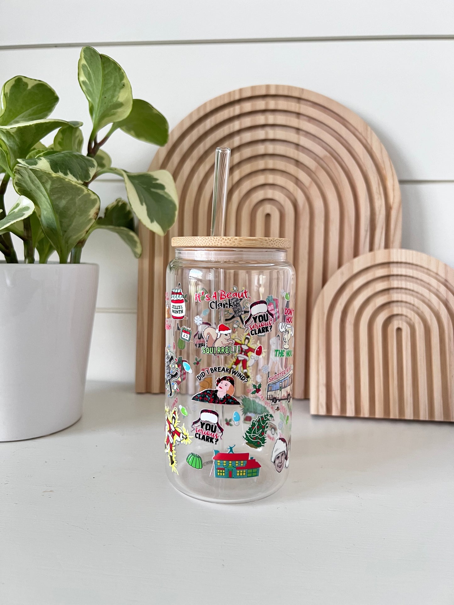 Glass cup with bamboo lid and glass straw featuring all the  iconic Christmas vacation movie clips