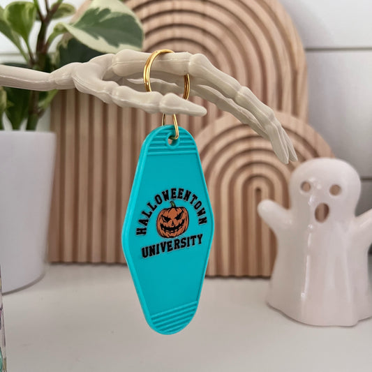 keychain with halloween university logo on it 