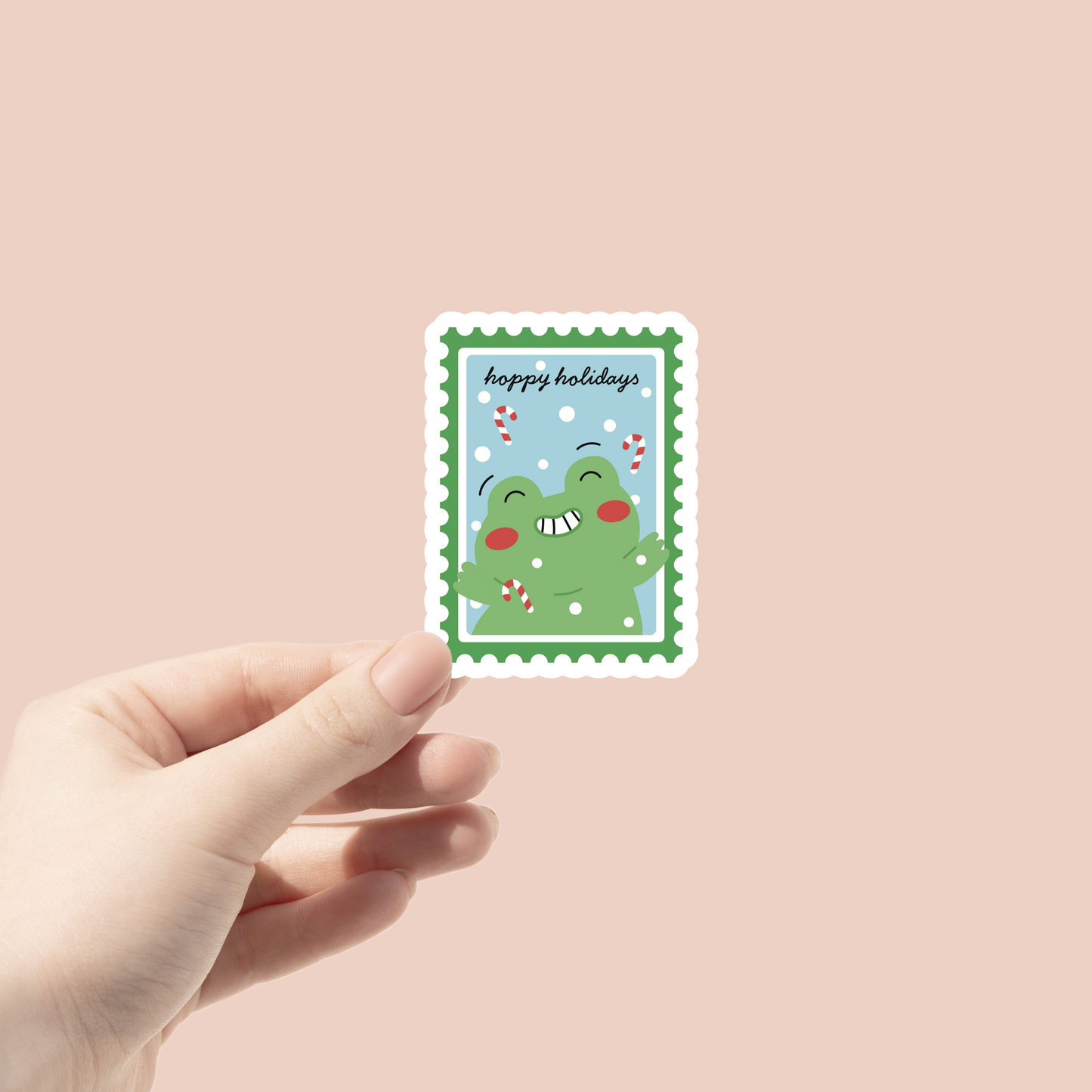 Cute stamp shaped with with  a holiday frog and happy holidays written aboce