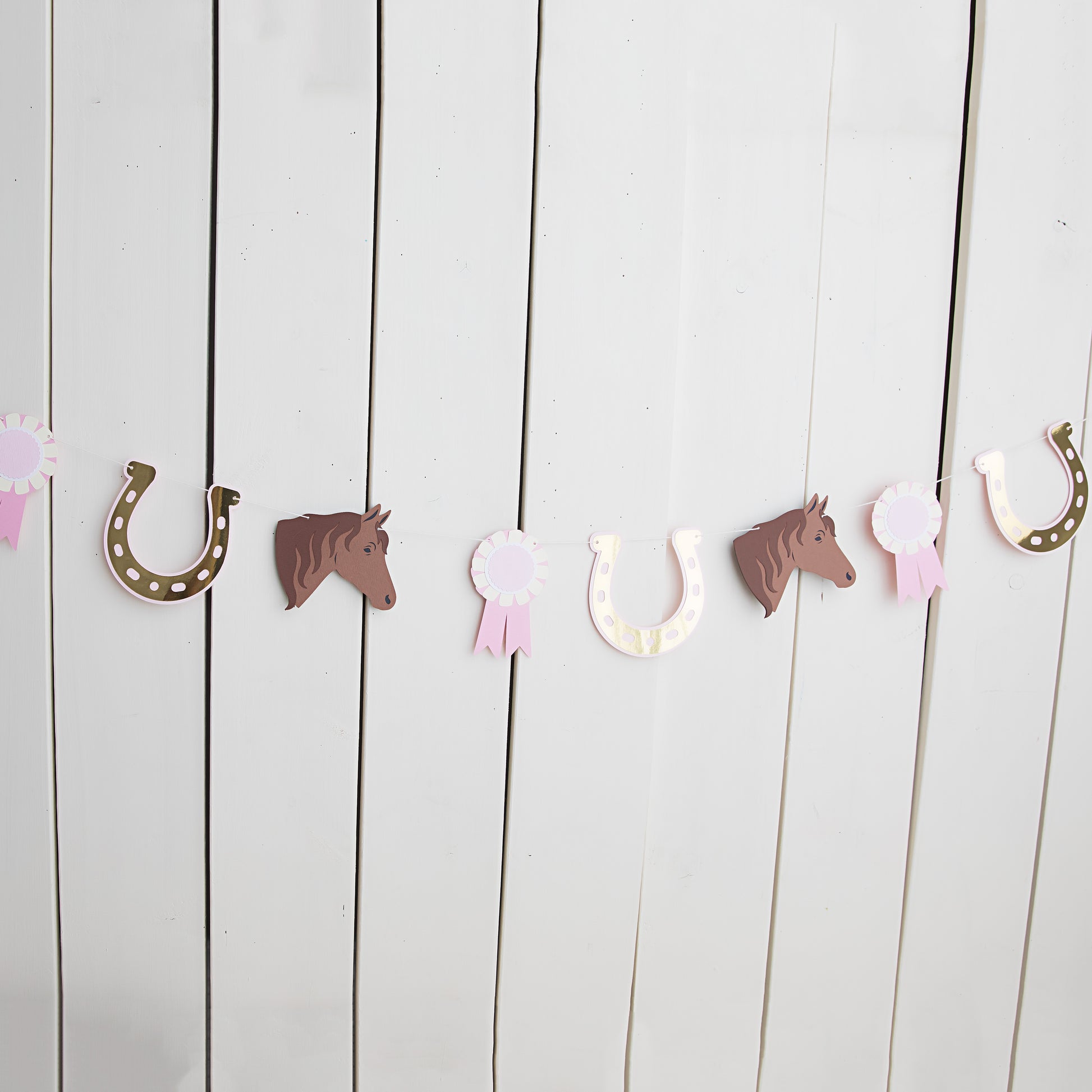 pony tales paper garland with horses, horseshoes and awards