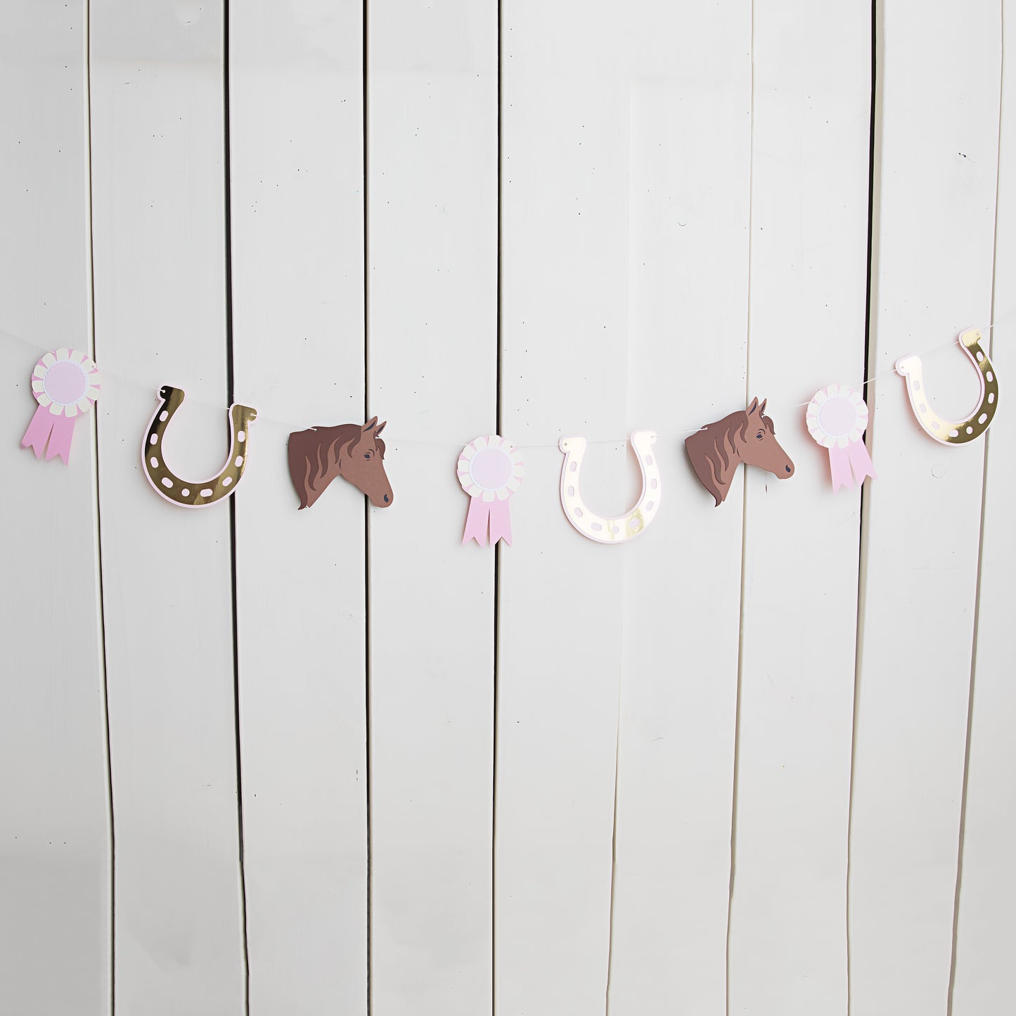 pony tales paper garland with horses, horseshoes and awards