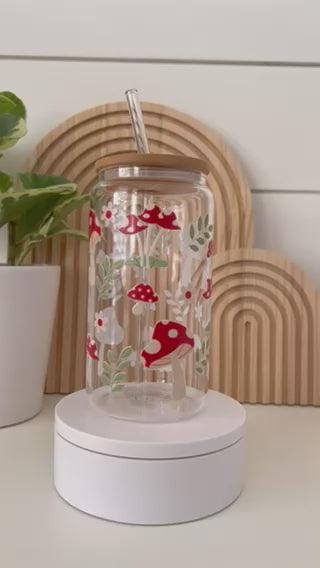 toadstool cup with bamboo lid and glass straw on turntable